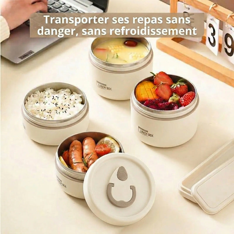 Quatre lunch box thermos beiges ouvertes sur un bureau, présentant différents repas : soupe, riz, saucisses avec citron, et fruits rouges